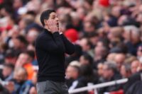 Arsenal fans and Bournemouth staff clash in angry scenes as stewards forced to step in