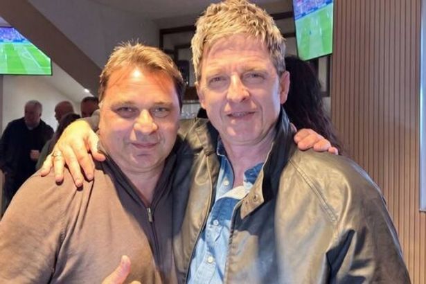 Premier League star looks very different as he’s pictured with Oasis icon at Man City