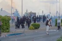 Arsenal fans caught up in trouble as police use TEAR GAS after clash with Atletico supporters