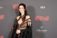 Anne Hathaway Leads a Red Carpet Double Life