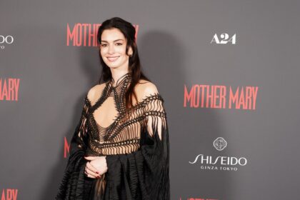 Anne Hathaway Leads a Red Carpet Double Life