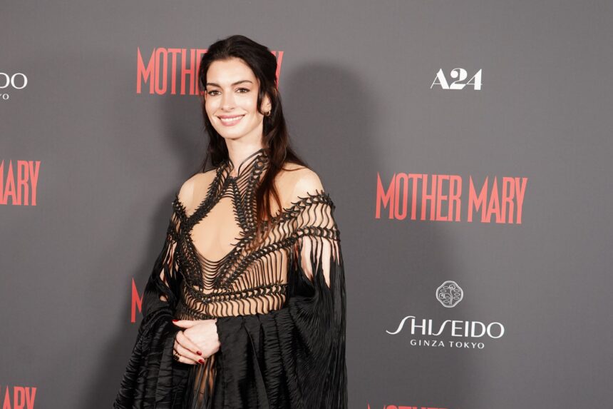 Anne Hathaway Leads a Red Carpet Double Life