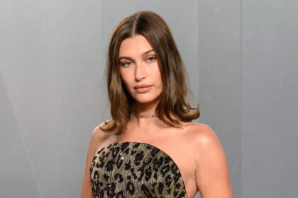 Hailey Bieber Reacts to Theory She Calls Paparazzi on Herself