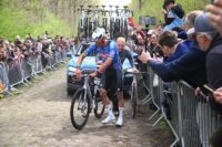 Mathieu van der Poel punctures twice on the Arenberg sector at Paris-Roubaix, teammate changes wheel