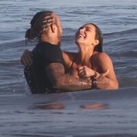Kim Kardashian, Lewis Hamilton Dive Into PDA During Steamy Beach Date