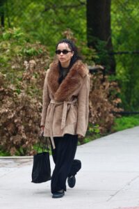 Zoë Kravitz Proves the Penny Lane Coat Will Always Be Famous