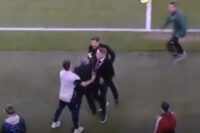 Diego Simeone pushes Arsenal chief Andrea Berta on touchline as UEFA official rushes in
