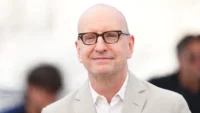 The AI in Soderbergh’s Lennon documentary caused an uproar at Cannes. The filmmaker explains