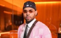 Chris Brown Receives Honorary PhD from Harvest Christian University