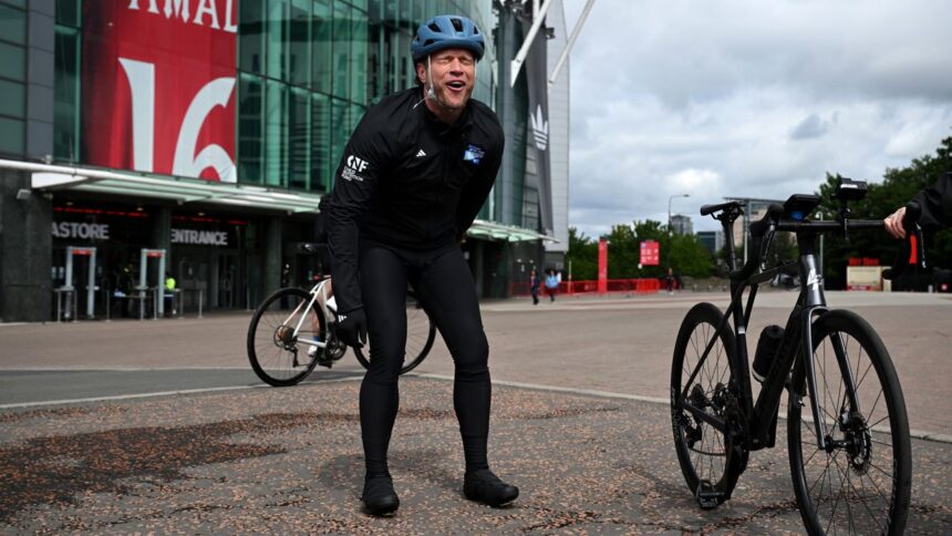 ‘It’s been brutal’ – Olly Murs cycles through torrential rain and the pain of a lost toenail to raise money for Unicef