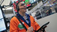 Dow gains 900 points as oil prices ease, while AI stocks keep Wall Street in check