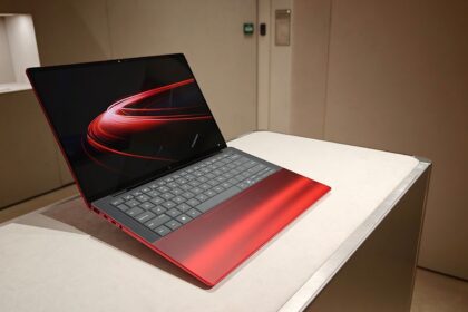 Ferrari and HP made a vivid red laptop with a transparent ‘engine bay’